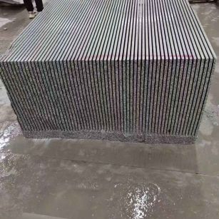 宁德芝麻白毛板荒料切割